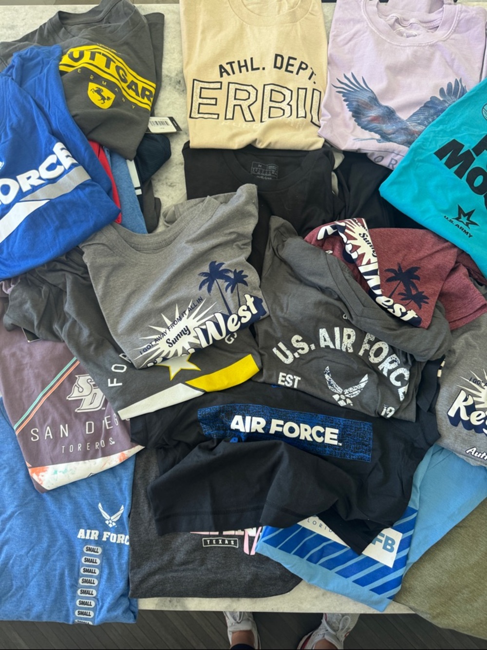 Lot of NWT graphic t shirts. Assorted sizes and brands.